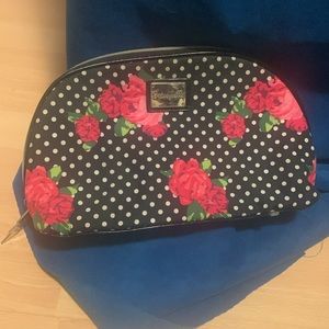 Betseyville large cosmetics case. Lightening bolt hardware. Clean inside
